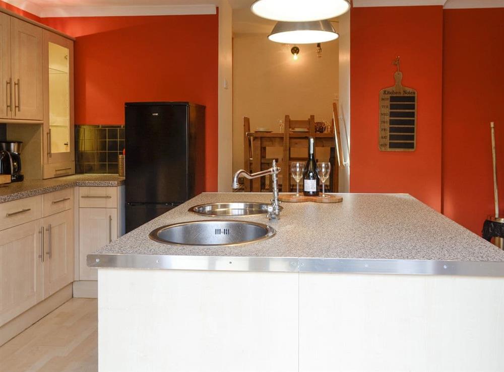 Well-equipped fitted kitchen at Burnbrae Cottage in Bridgend of Lintrathen, near Forfar, Angus