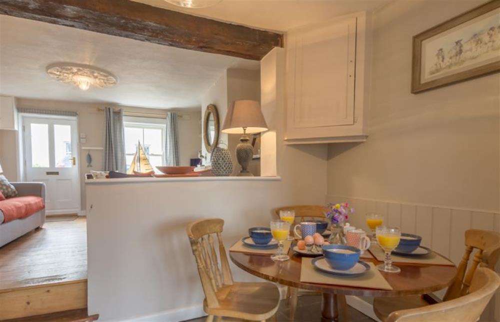 Ground floor: Dining area with step up to Sitting room at Burnham Cottage, Wells-next-the-Sea
