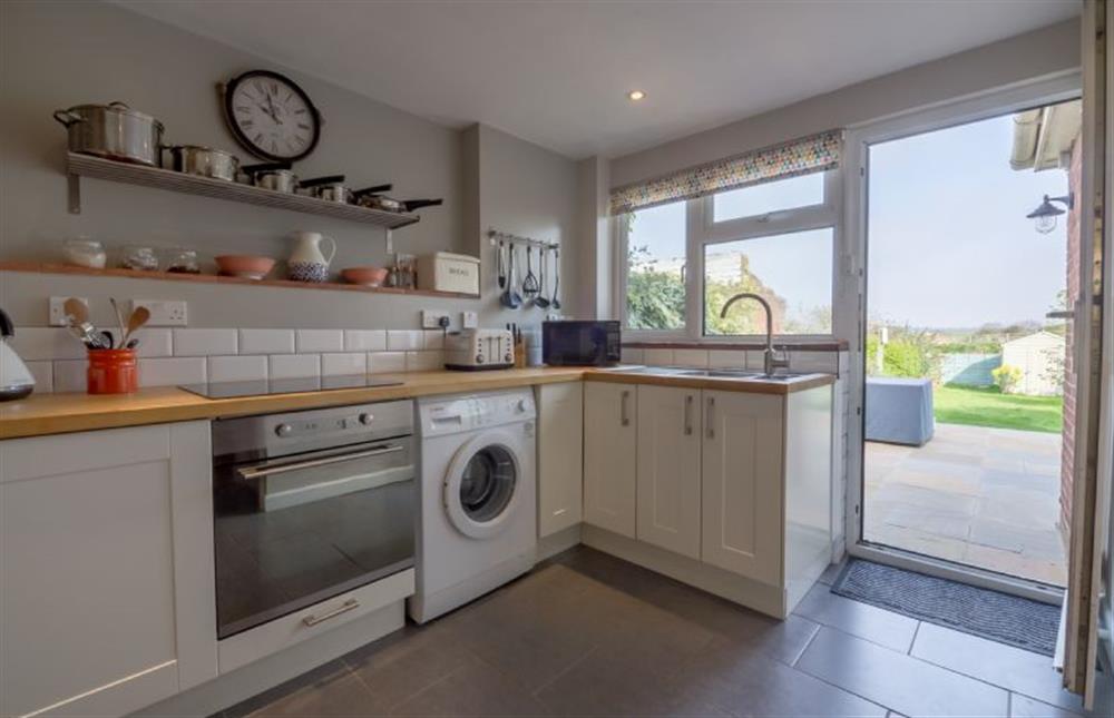 Ground floor: Kitchen with back door to garden at Burnham Cottage, Wells-next-the-Sea
