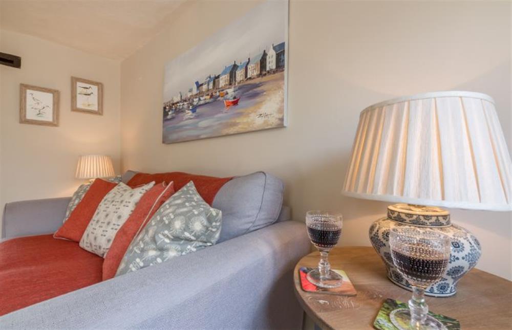 Ground floor: Sitting room with large settee at Burnham Cottage, Wells-next-the-Sea
