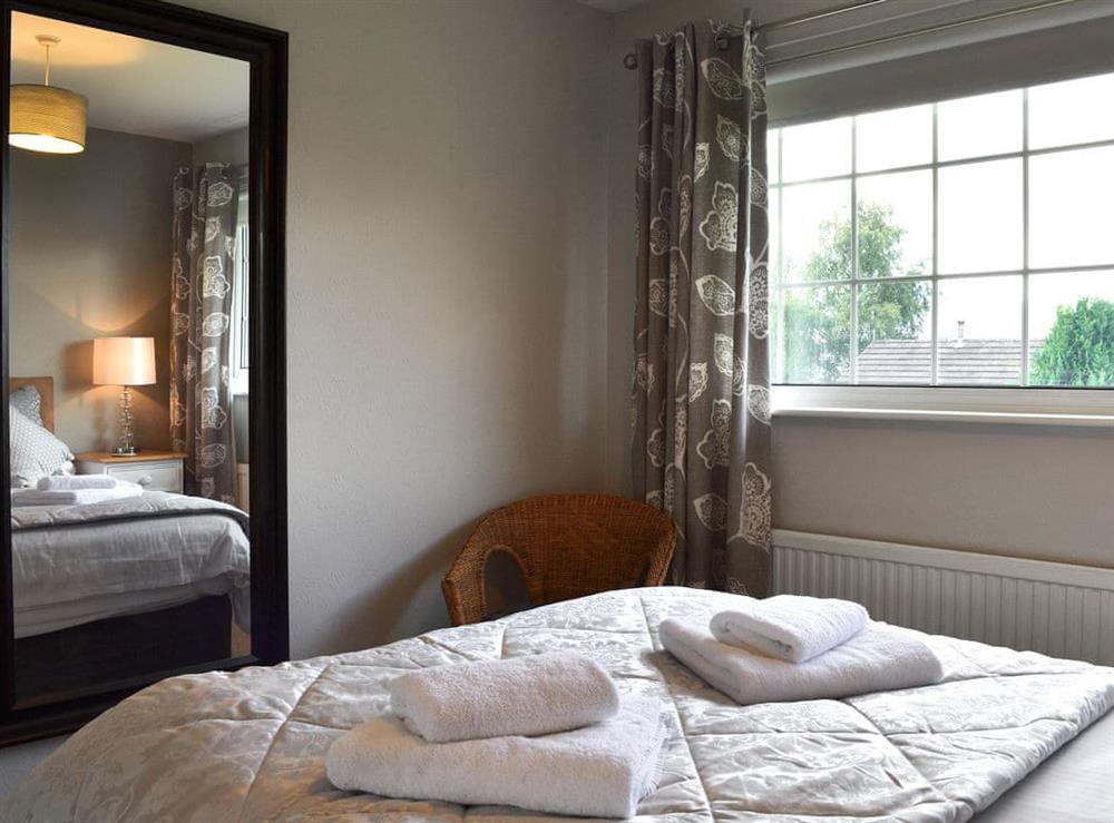 Tastefully furnished bedroom at Burns Knott in Keswick, Cumbria
