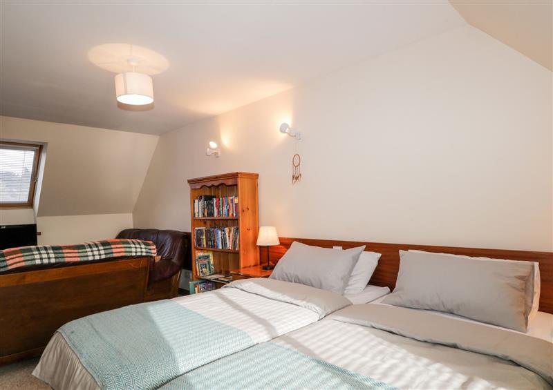 A bedroom in Burnside Cottage (photo 2) at Burnside Cottage, Lairg