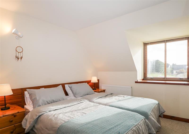 One of the bedrooms at Burnside Cottage, Lairg