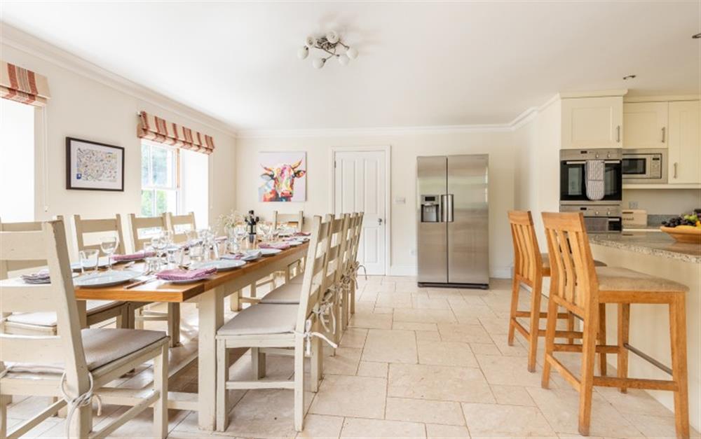 Large dining area within the kitchen  at Burnt House in Bantham