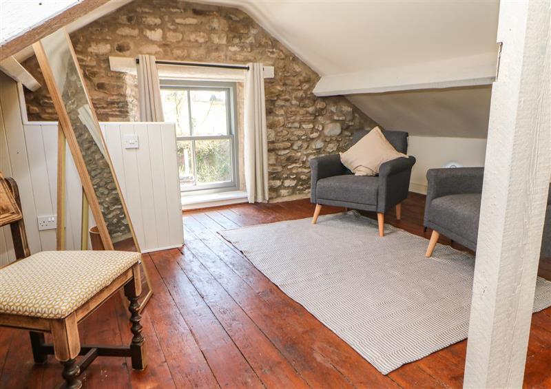 Relax in the living area (photo 3) at Burnt Mill Cottage, Sedbergh