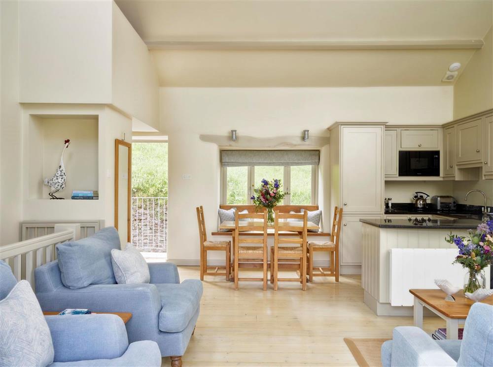 The open-plan sitting, dining and kitchen area at Burrator Cottage, Dartmouth