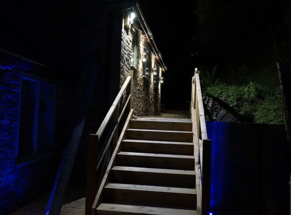 Steps to Driveway lit at night at Burrills View in Horderley, near Craven Arms, Shropshire