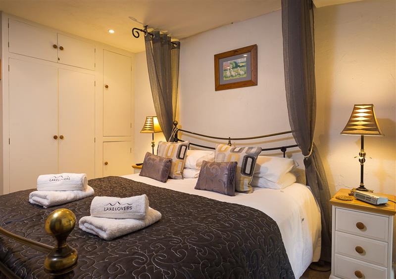 This is the bedroom at Burrow Cottage, Bowness