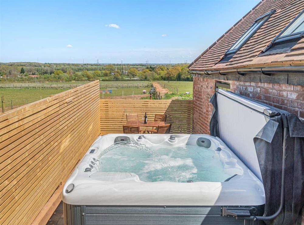 Jacuzzi at Burrow Hill Farm Barn B in Corley, Warwickshire