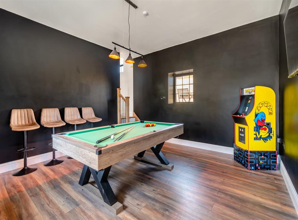 Games room at Burrow Hill Farm Barn C in Corley, Warwickshire