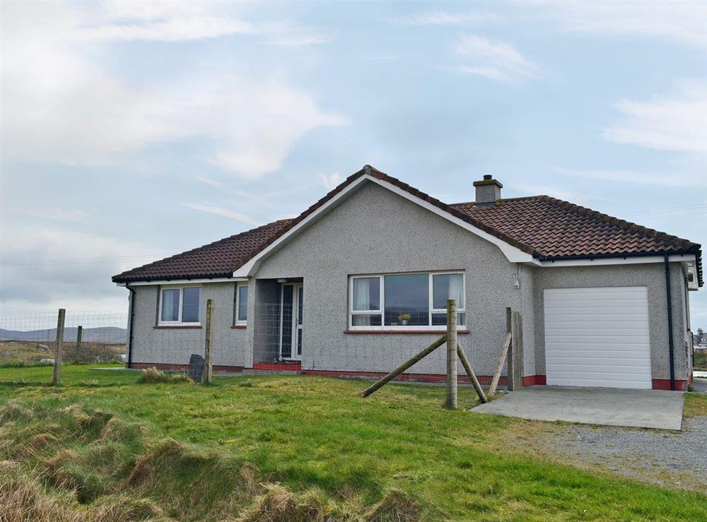 Bute Cottage is a detached property