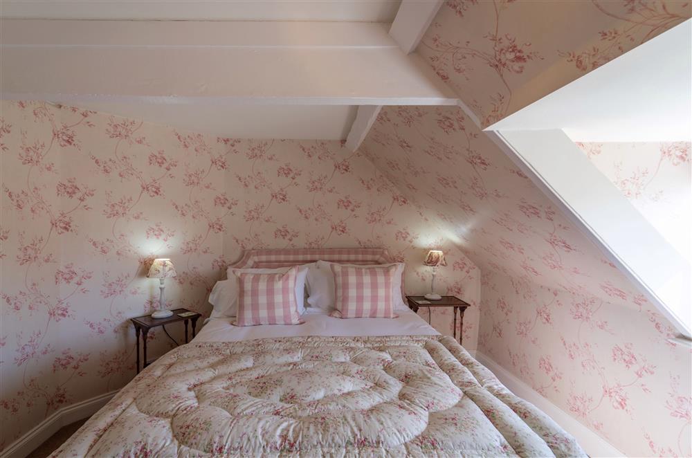 Another of the bedrooms offering a bright and comfortable space at Butley Priory Farmhouse, Woodbridge