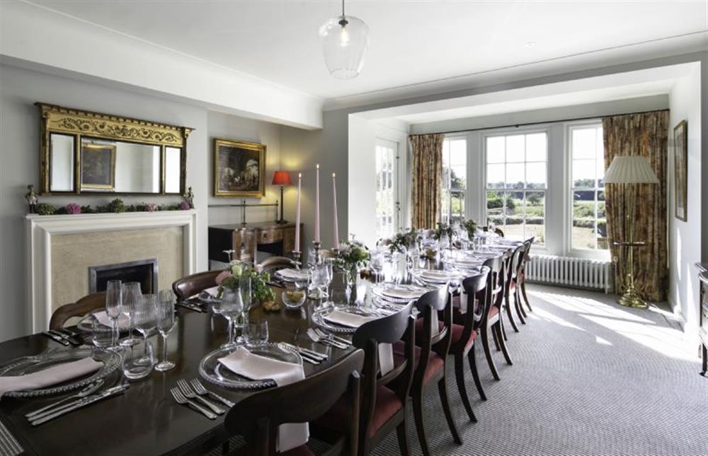 Enjoy dinner together in the elegant dining room  at Butley Priory Farmhouse, Woodbridge