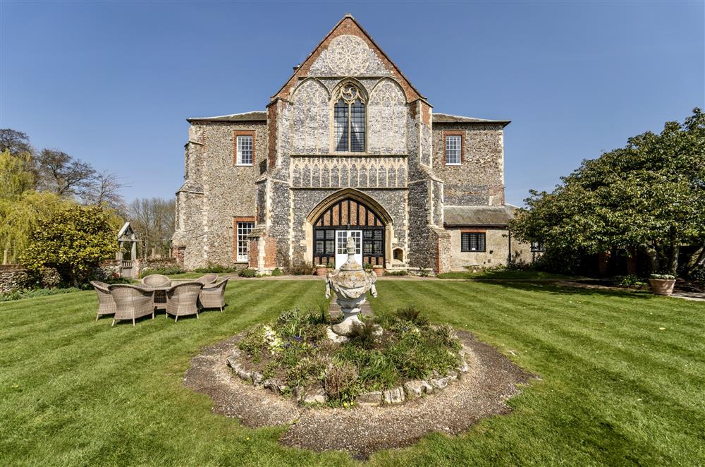 Double doors lead from the Great Hall directly into the stunning garden at Butley Priory, Woodbridge