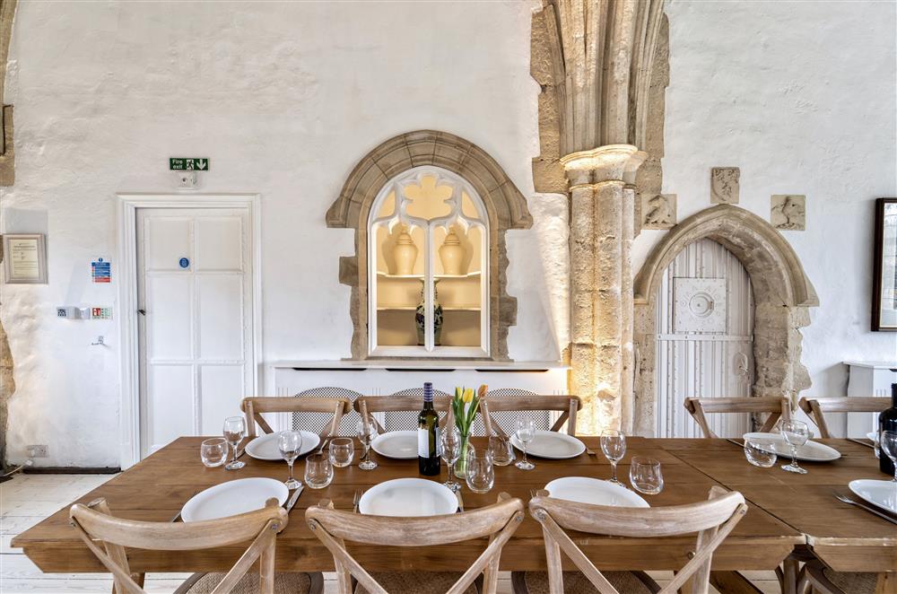 Great Hall with dining table and chairs  at Butley Priory, Woodbridge