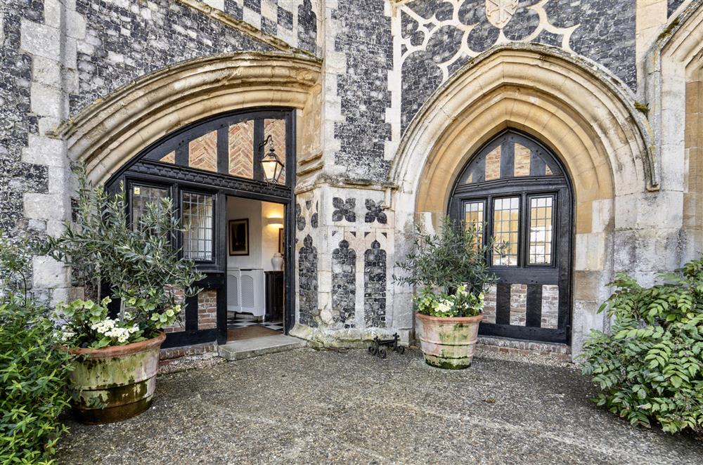 Large double doors lead directly to the garden at Butley Priory, Woodbridge