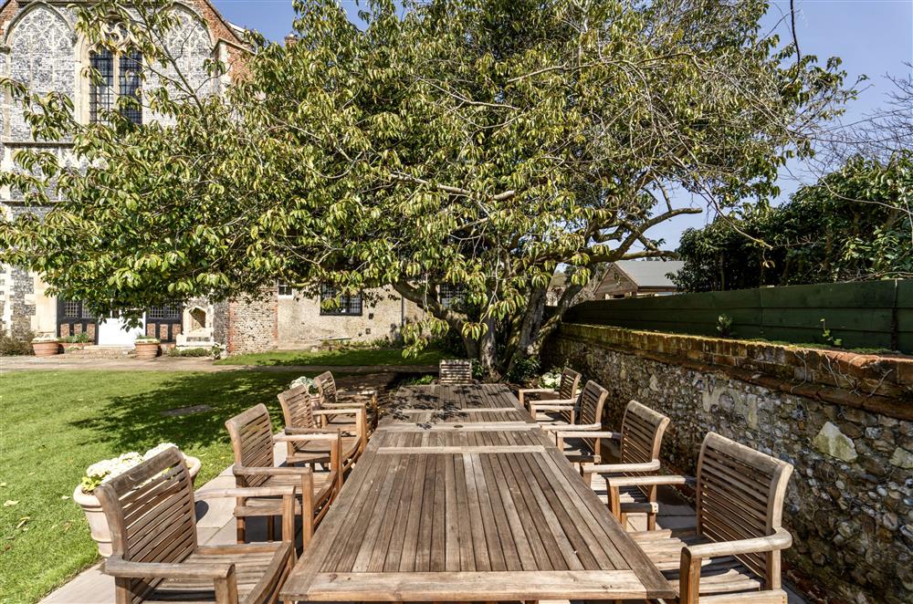 Plenty of outdoor furniture to enjoy the tranquil setting at Butley Priory, Woodbridge
