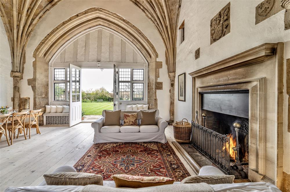 The Great Hall Sitting Room is a large space with stunning vaulted ceilings at Butley Priory, Woodbridge