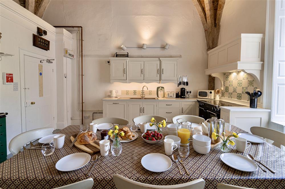 The kitchen, with dining table  at Butley Priory, Woodbridge