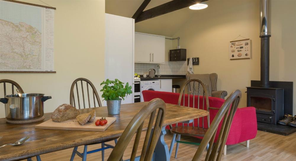 The kitchen, sitting and dining room at Butter Hill Barn in Lynmouth, Devon
