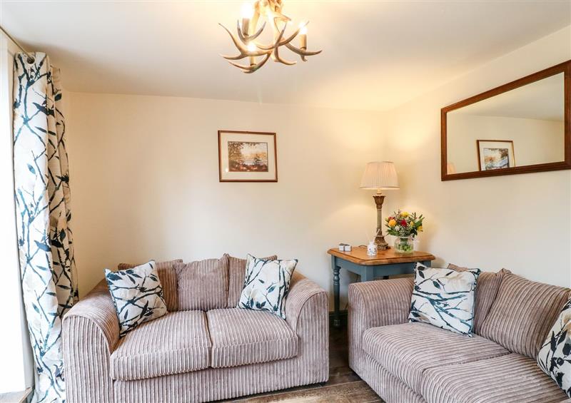 Relax in the living area at Buttercross Cottage, Abbots Bromley