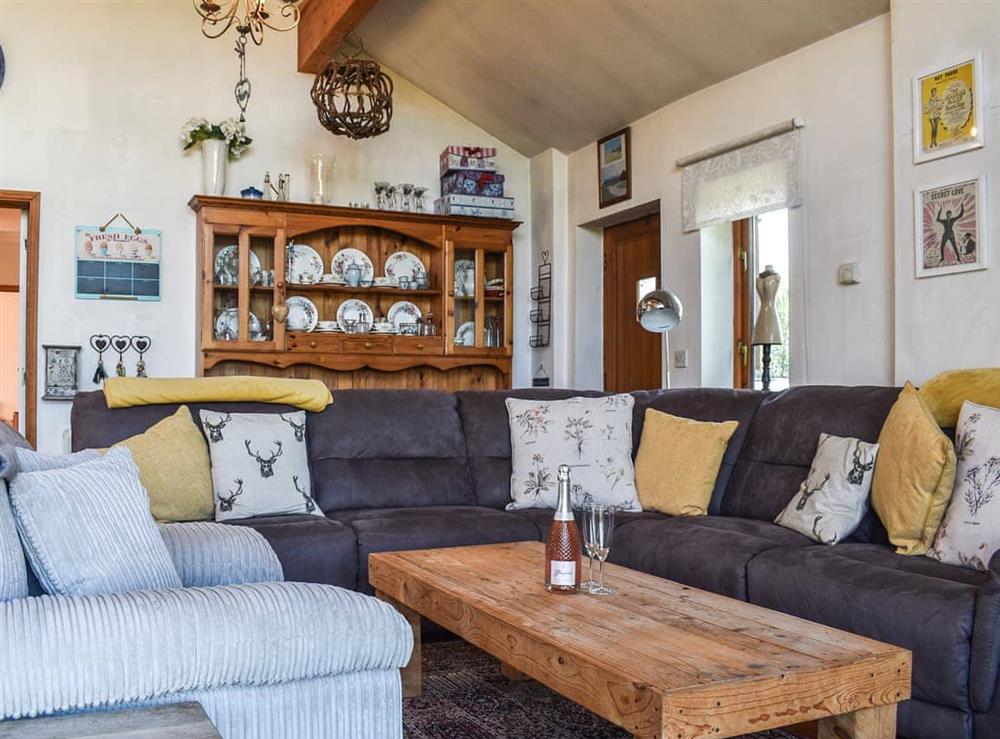 Living area at Buttercup Barn in Wootton, Isle of Wight