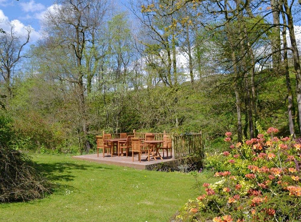 Attractive shared garden and grounds at Butterfly Cottage in Kendal, Cumbria