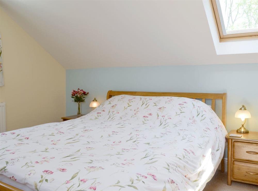 Restful first floor double bedroom at Butterfly Cottage in Kendal, Cumbria