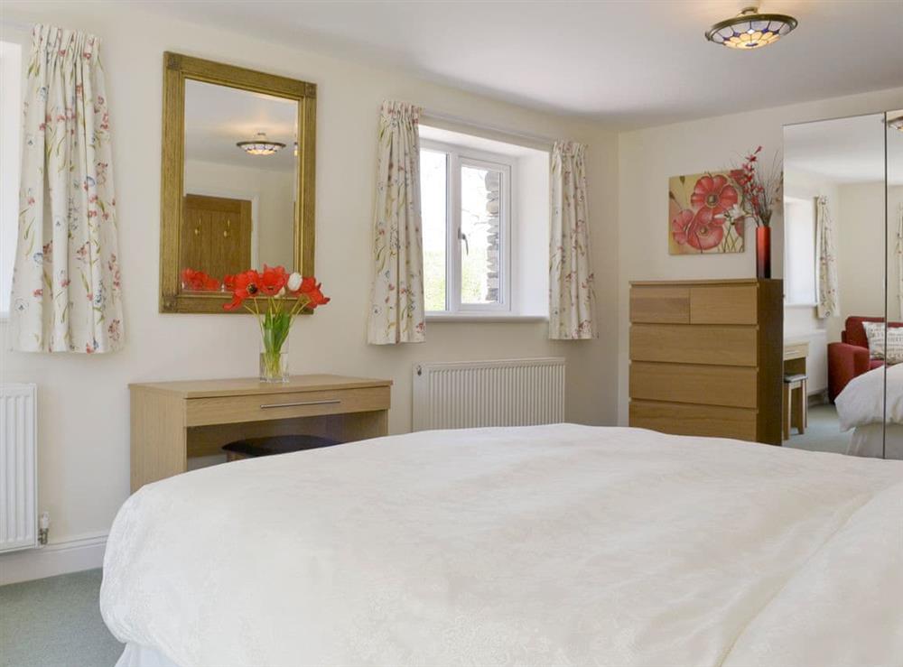 Spacious ground floor double bedroom at Butterfly Cottage in Kendal, Cumbria