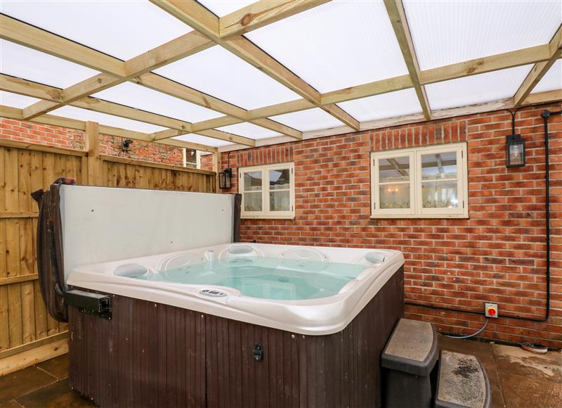 The hot tub at Butterfly Cottage, Maltby le Marsh
