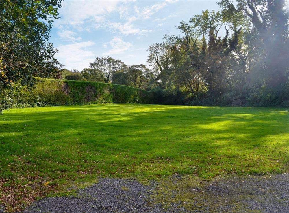 Large, enclosed lawned garden (photo 3) at Butterhole Farmhouse in Mabie, near Dumfries, Dumfriesshire