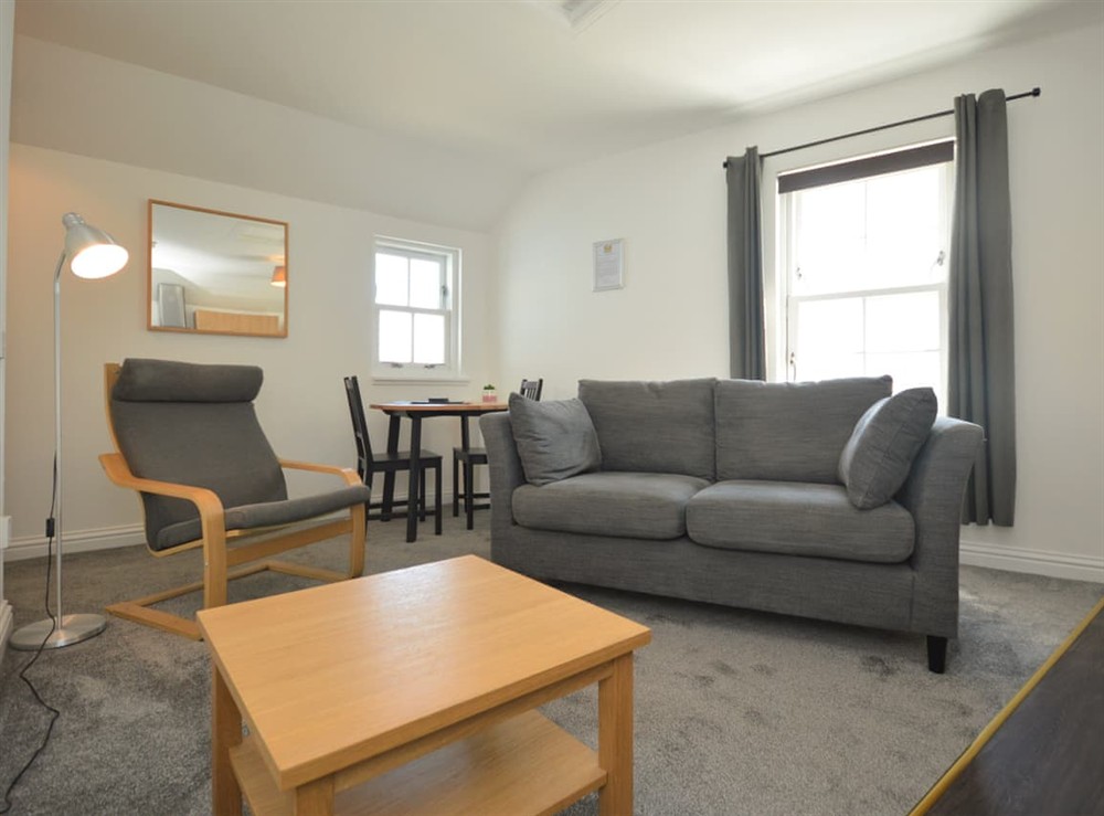 Open plan living space at Buzzard Apartment in Isle of Mull, England