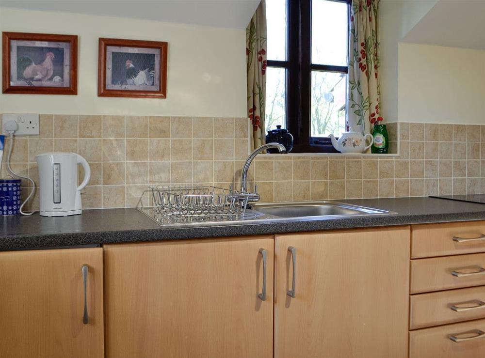 Kitchen (photo 2) at Buzzard Cottage in Defynnog, near Brecon, Powys