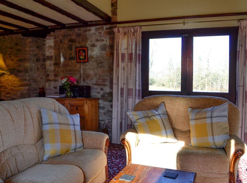 Lounge area at Buzzard Cottage in Defynnog, near Brecon, Powys
