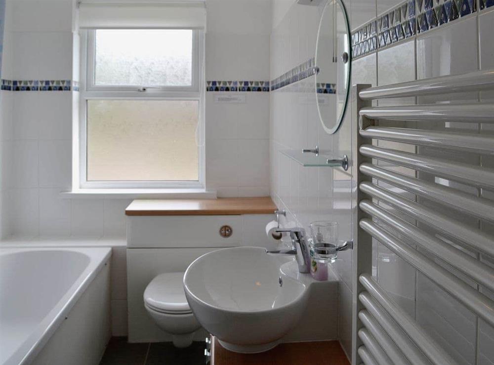 Lovely bathroom with heated towel rail at Buzzards in Bothenhampton, near Bridport, Dorset