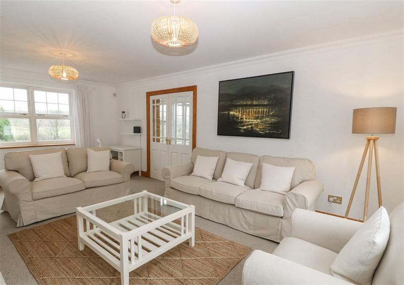 Relax in the living area at Bwthyn Clai, Llangefni