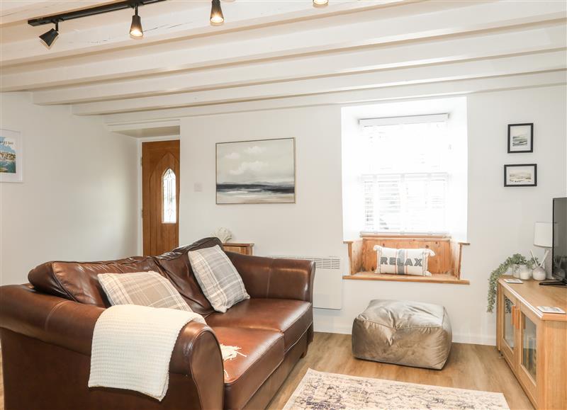 Relax in the living area at Bwthyn Lili (Lilly Cottage), Cemaes Bay