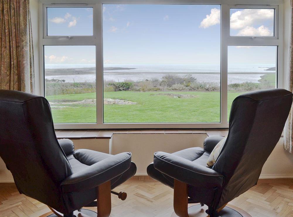 Awesome views from the cottage looking out over Cemlyn Bay at Bwthyn Pereos in Cemaes Bay, Gwynedd