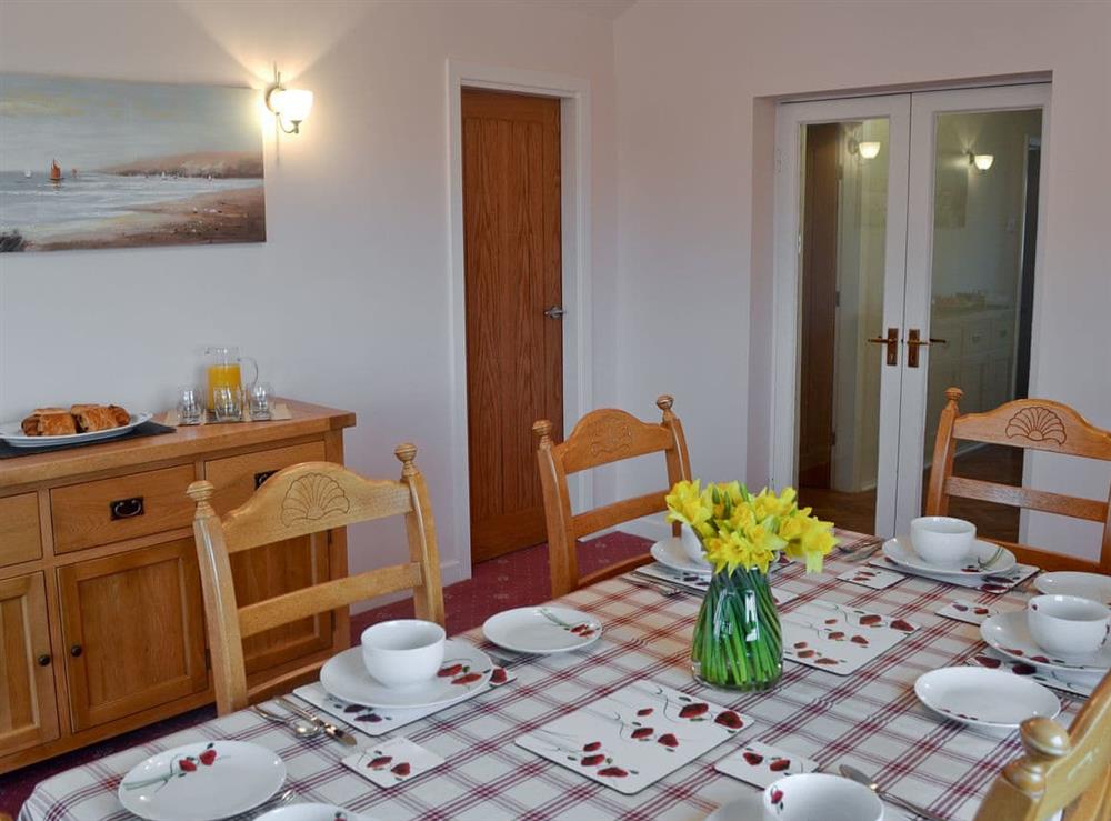 Lovely dining room at Bwthyn Pereos in Cemaes Bay, Gwynedd
