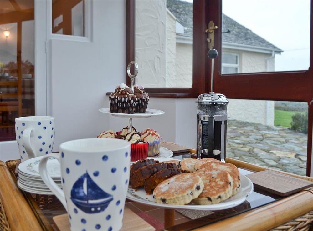 Tea in the conservatory at Bwthyn Pereos in Cemaes Bay, Gwynedd