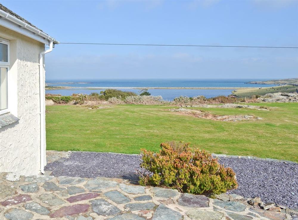 View looking out to sea at Bwthyn Pereos in Cemaes Bay, Gwynedd