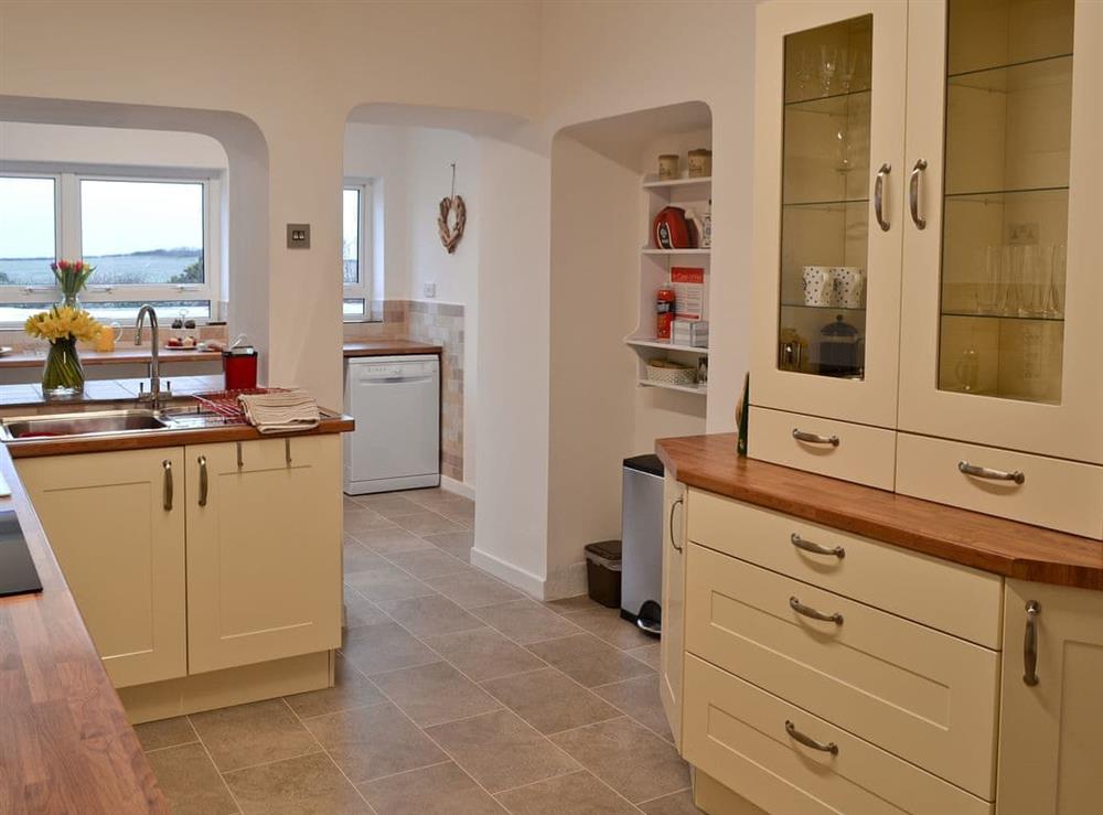 Well equipped kitchen (photo 2) at Bwthyn Pereos in Cemaes Bay, Gwynedd
