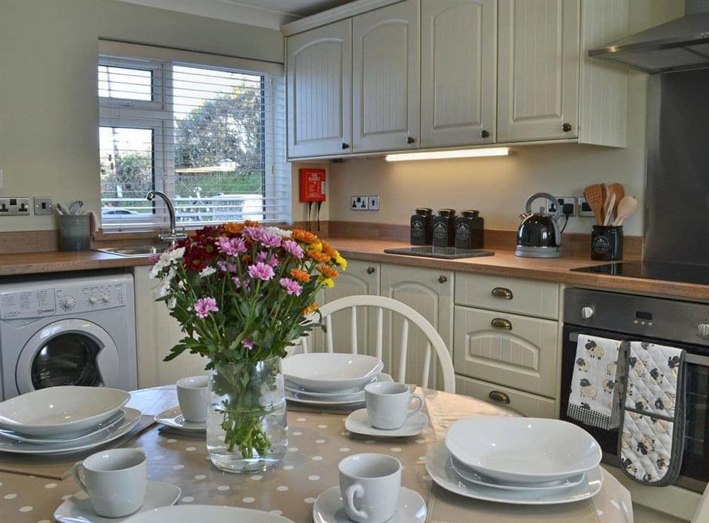 Tastefully modernised kitchen/dining room (photo 2) at Bwthyn Tyddyn Sachau in Y Ffôr, near Pwllheli, Gwynedd
