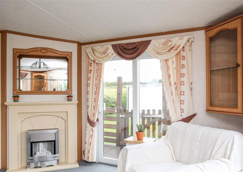 This is the living room at Bwthyn Y Bae Lodge, Church Bay near Llanfaethlu