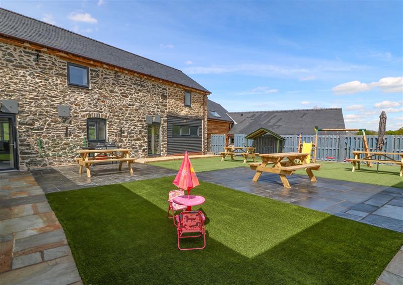 Enjoy the garden at Bwthyn Y Bugail (Shepherds Cottage), Pedairffordd near Llanrhaeadr-Ym-Mochnant