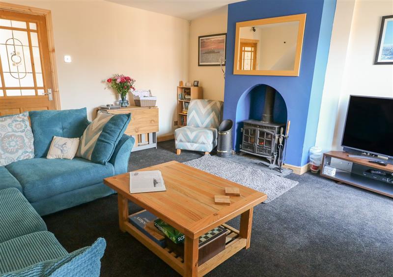 Relax in the living area at Bwythn Penfro, Haworth