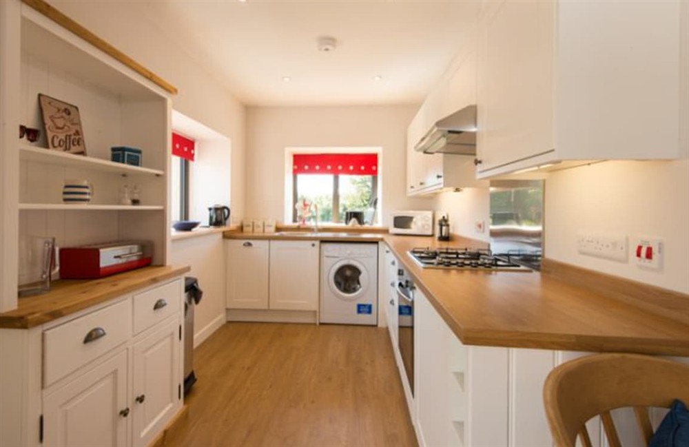 Kitchen area (photo 2) at By the Byre in Bude, Cornwall
