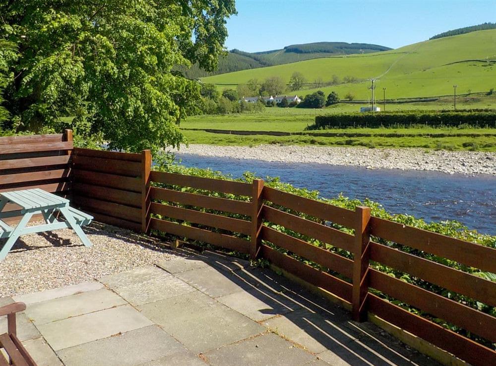 Sitting-out-area with river views at Bydand in Walkerburn, Peebleshire