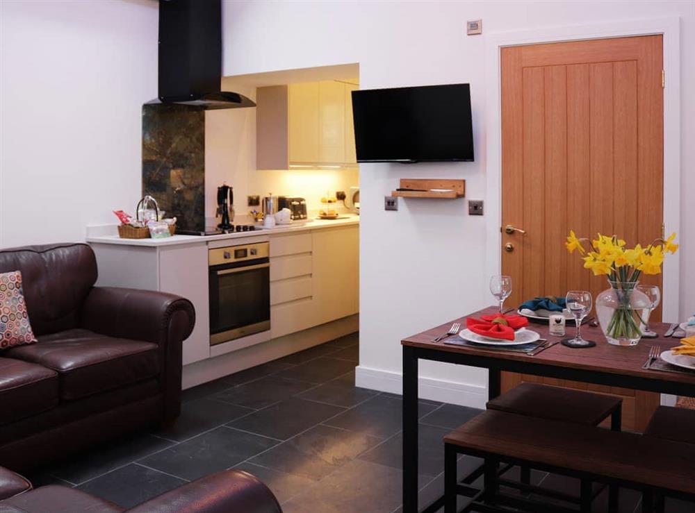 Open plan living space at Byn Guest House Cottage in Conwy Town, Gwynedd