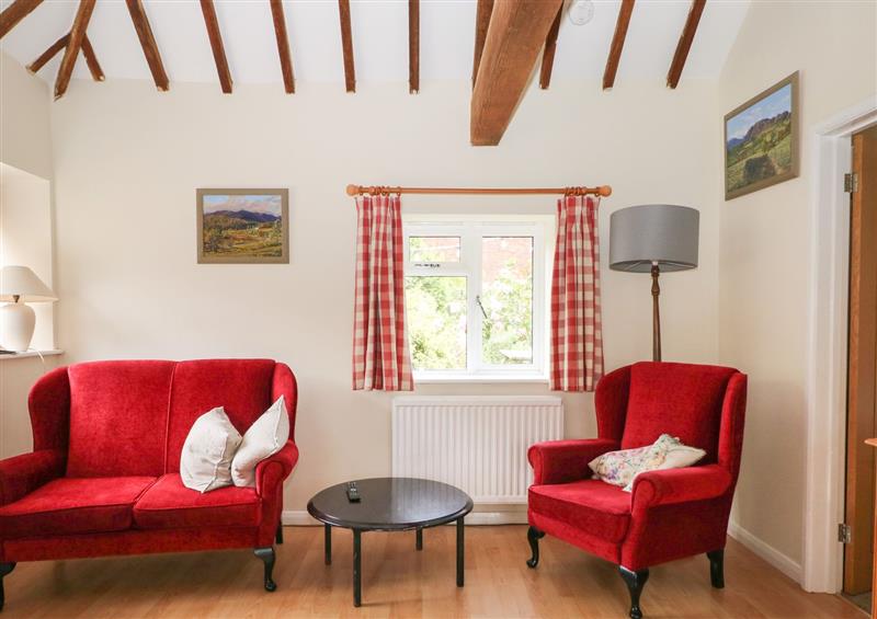 Enjoy the living room at Byre Cottage 1, Sullington near Storrington